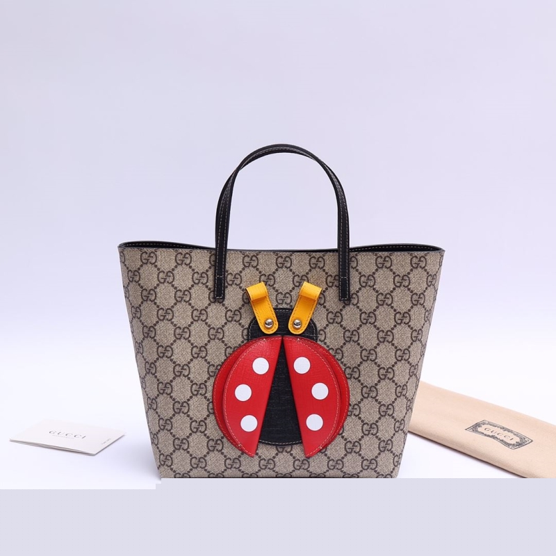 G*u*i shopping bags